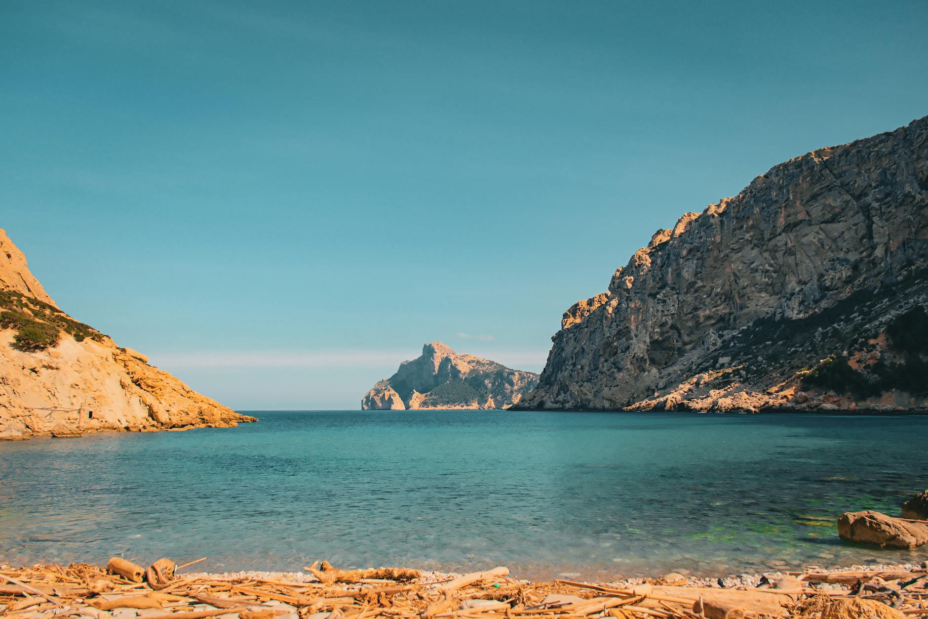 Dramatic rocky cliffs of the Mallorca coast from a boat